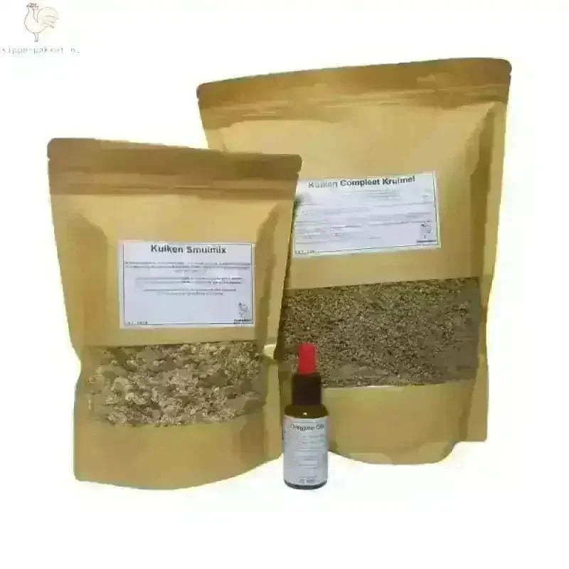 Compleet starterspakket kuikens met uitgebalanceerd kuikenvoer, kruidenmix en natuurlijke oregano olie voor gezonde groei.